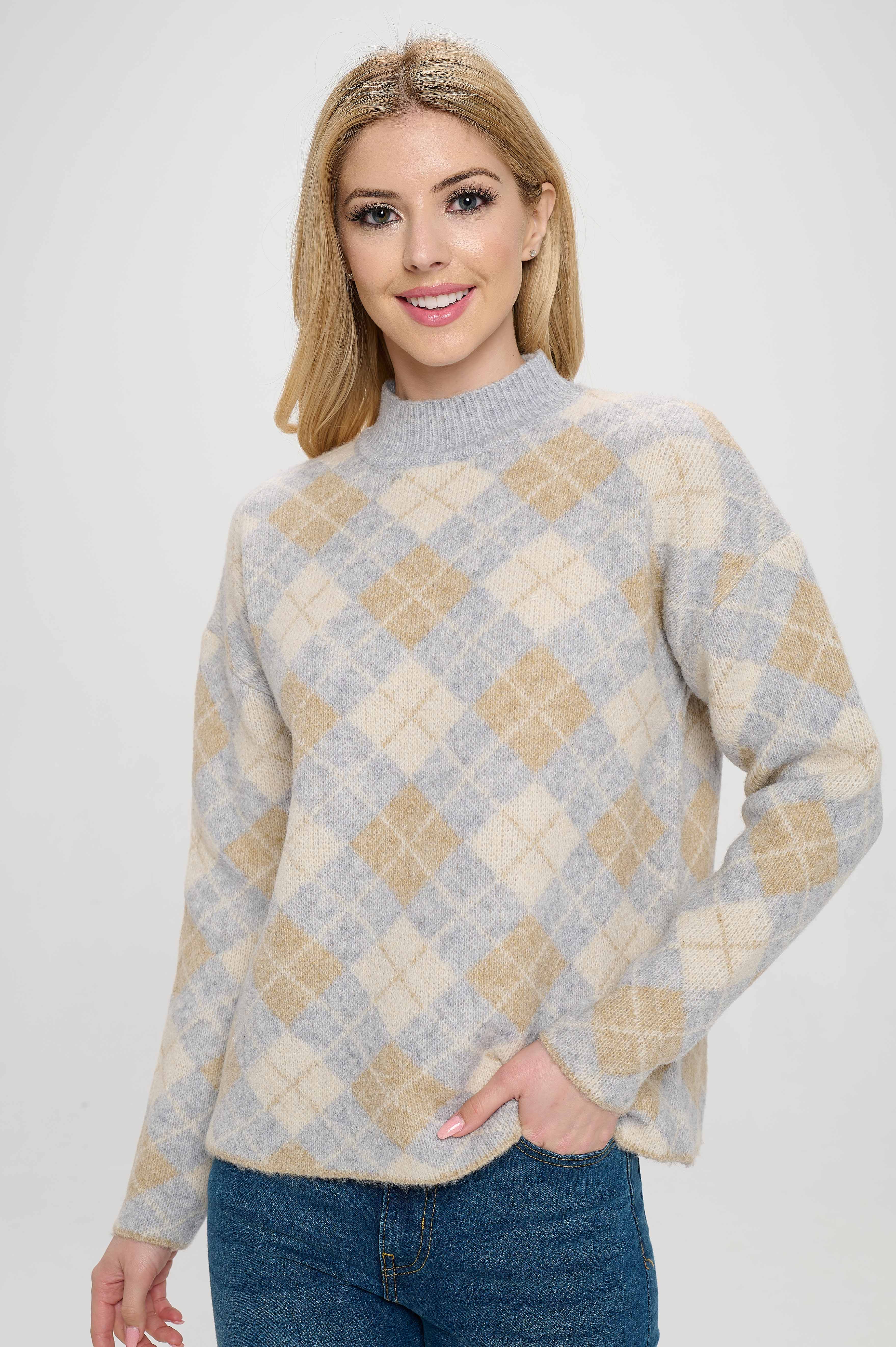 The cardigan is primarily a neutral color, but it has a tint of gray that adds a subtle touch of depth and dimension to the design. This makes it a versatile piece that can be easily paired with a variety of other colors and patterns in your wardrobe.