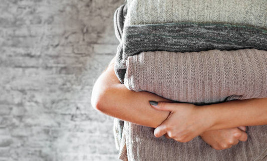 How to Wash & Store Sweaters Without Damaging Them