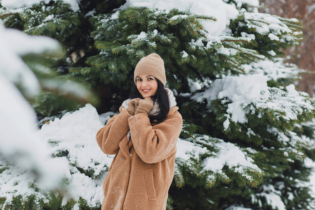 girl in beige coat winter season