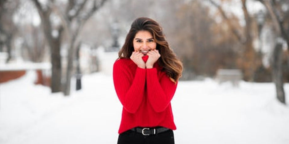 women wearing red sweater with black pant