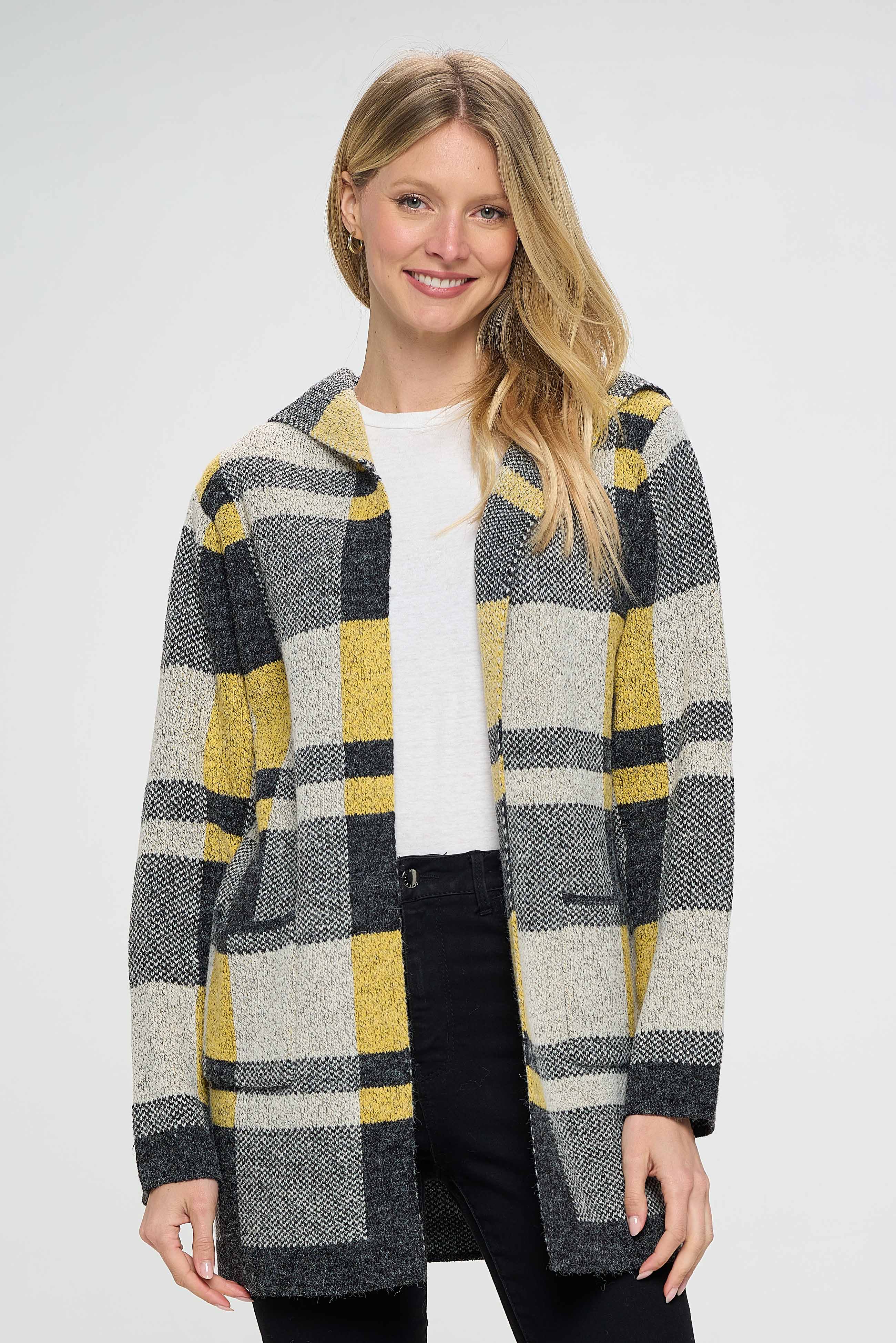 Our stylish pullover with gray, yellow, and black shades and a plaid pattern is a unique and fashionable piece of clothing that can be worn in a variety of settings. The pullover features a slim fit and relaxed fit, which provides a comfortable and flattering fit for a variety of body types. 