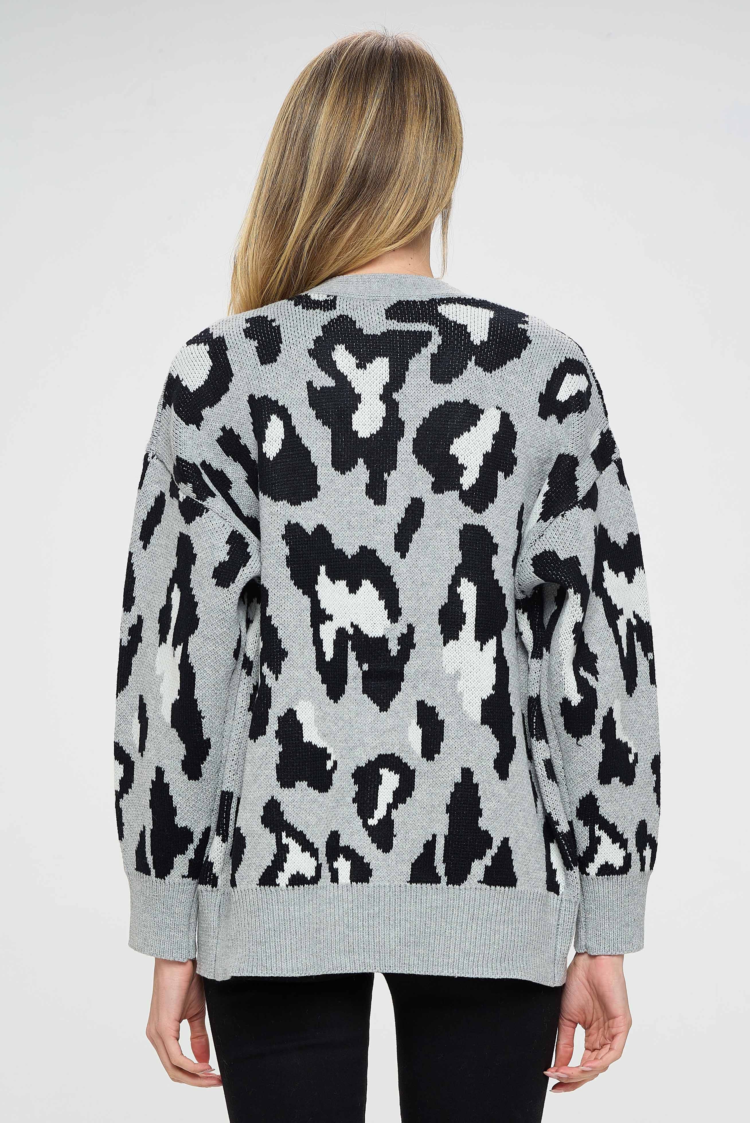 The unique leopard print design adds a touch of glamour to the sweater, making it perfect for any fashion-forward individual. The sweater can be dressed up or down, making it suitable for a variety of occasions.