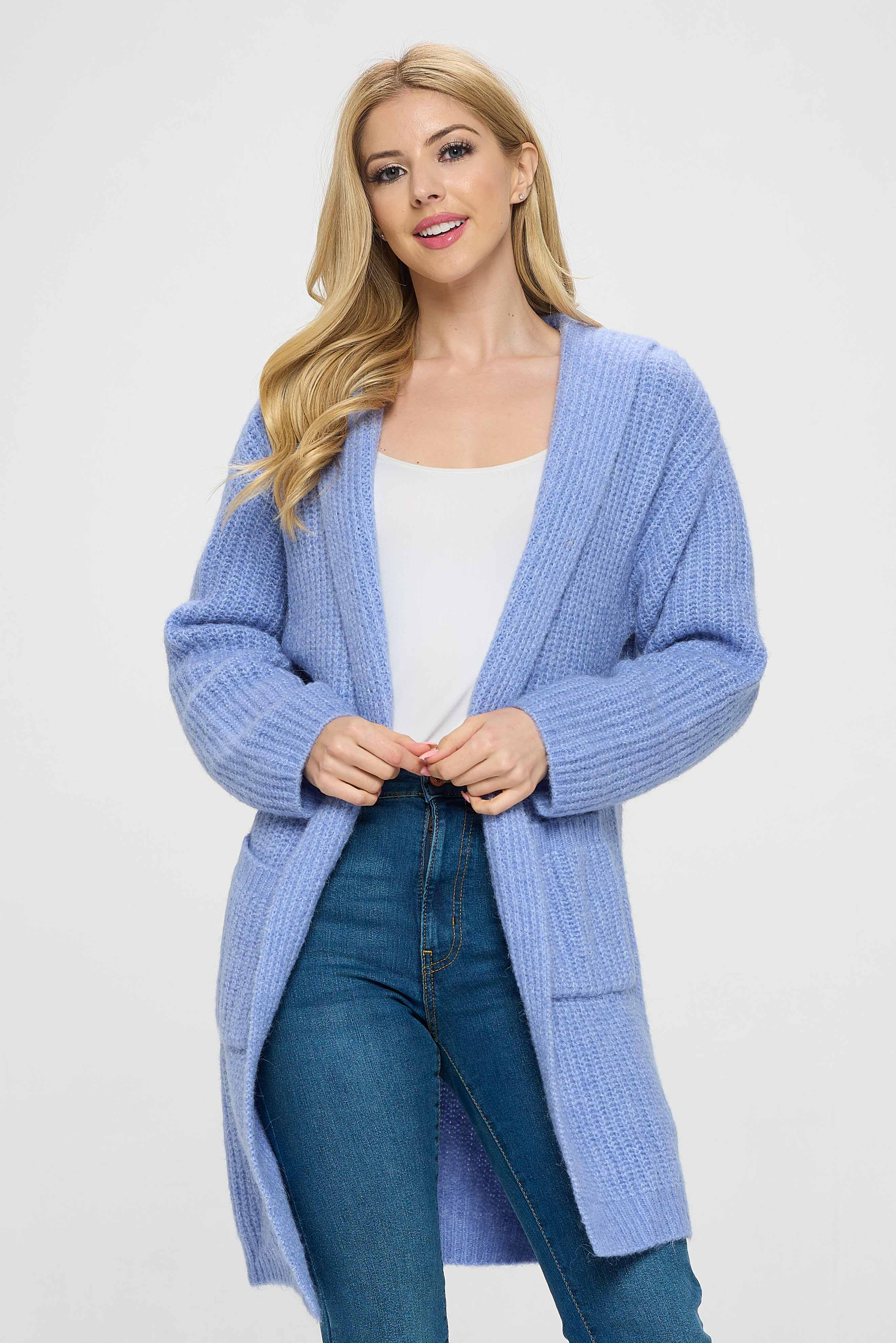 This blue hoodie is not your typical hoodie. It has a unique shrug style that sets it apart from other hoodies you may have seen before. The shrug design creates a layered effect, with the upper part of the hoodie resembling a shawl or cape that drapes over the shoulders. This gives the hoodie a distinctive and stylish look that is sure to turn heads. 