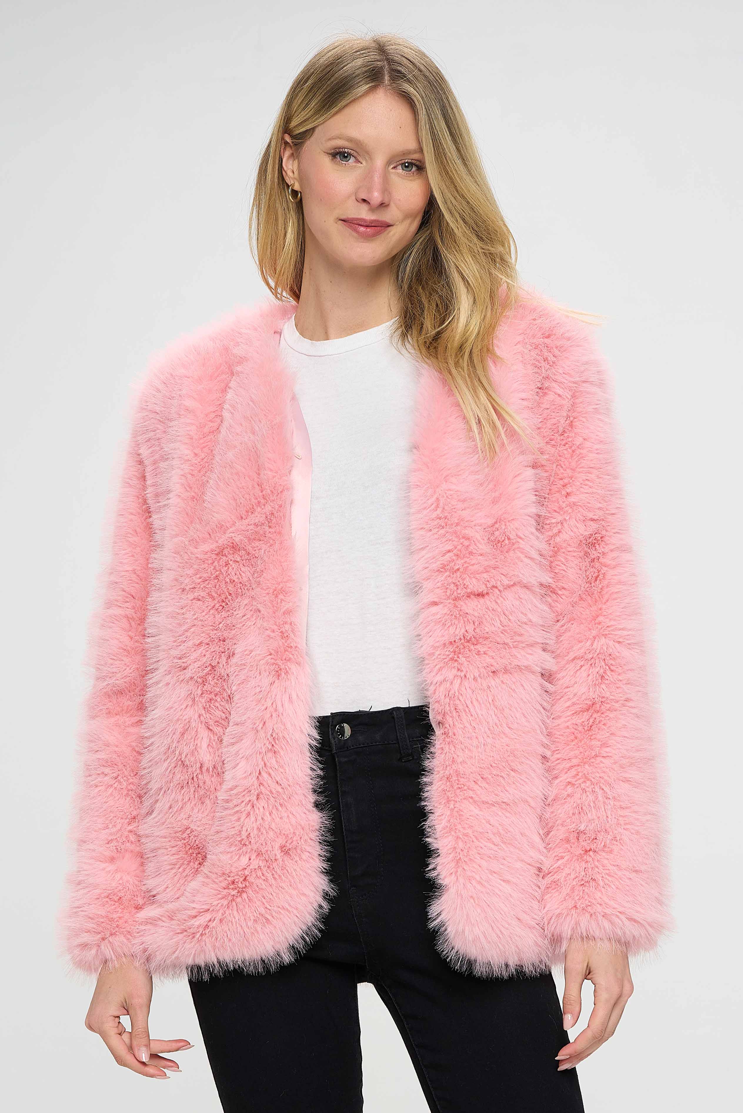 The pink fur coat being described here is a stunning piece that is designed to make you feel like a fashion icon. The unique texture of the fur and the flattering fit of the coat make it suitable for any occasion, whether it's a formal event or a night out with friends. The vibrant pink color adds a pop of fun to any outfit, making it a great choice for those who want to stand out from the crowd. 